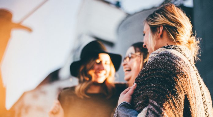 Making Friends: Military Spouse Edition priscilla-du-preez via unsplash three women laughing