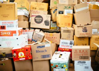 Tips for Moving with Toddlers chuttersnap via unsplash - moving boxes