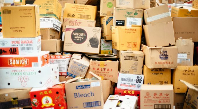 Tips for Moving with Toddlers chuttersnap via unsplash - moving boxes