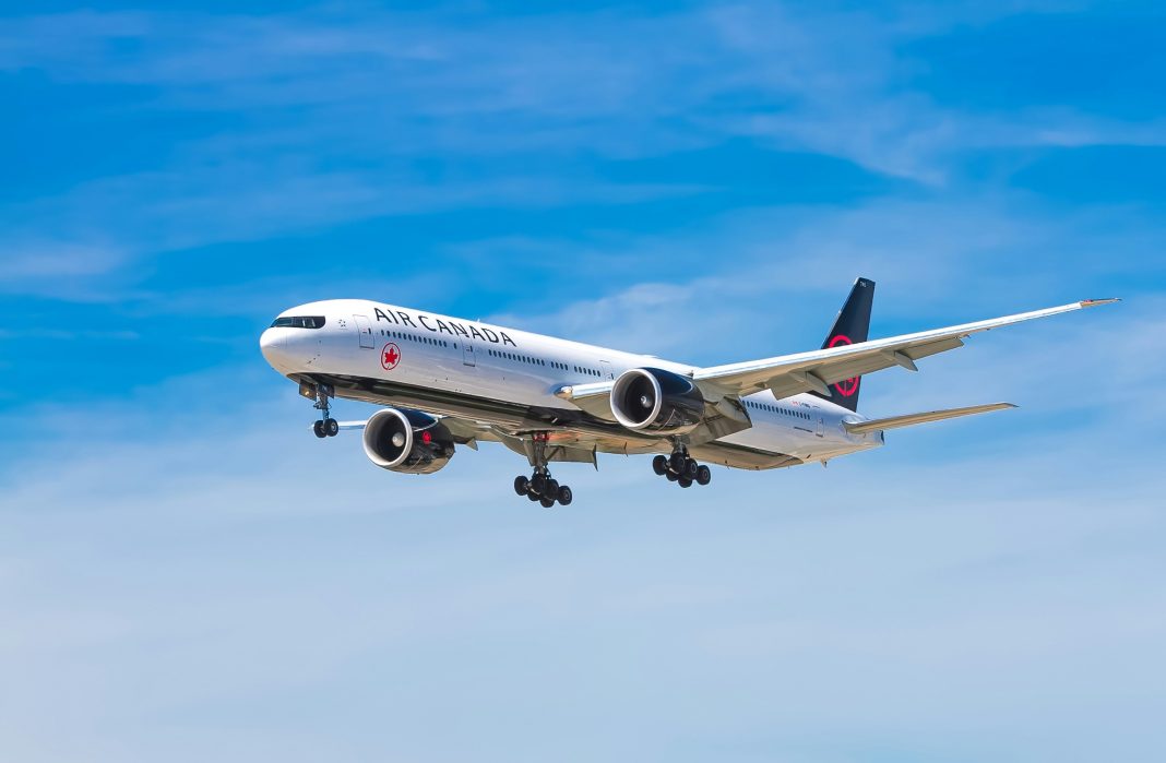 john-mcarthur via unsplash Air Canada plane in the sky