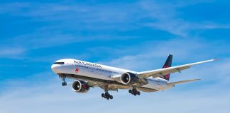 Flying Solo…Literally! john-mcarthur via unsplash Air Canada plane in the sky