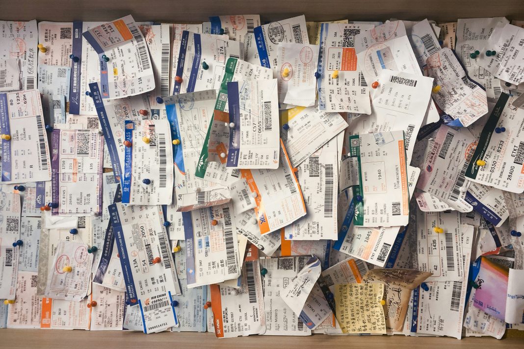 Ticket System billow926 via unsplash tickets hung on a cork board