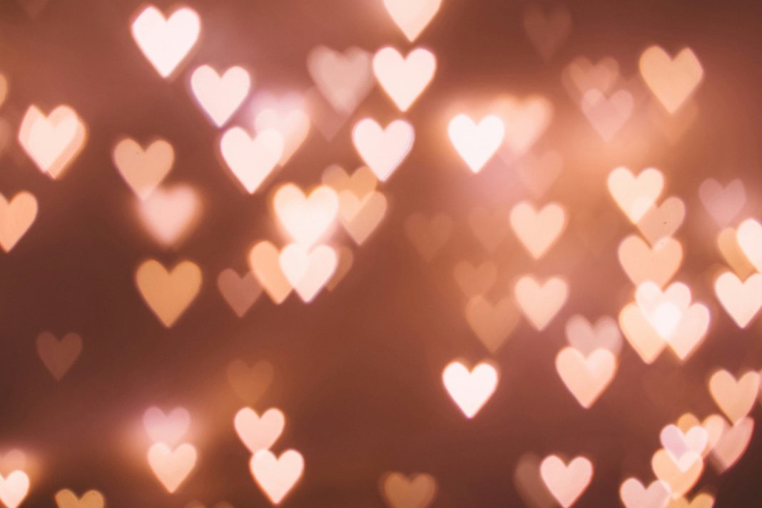 lights that look like hearts on a pink ish brown background