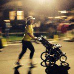 Holly using her Baby Trend Expedition at a night race