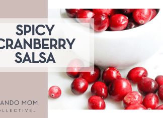 Spicy Cranberry Salsa Melissa Di Rocco via Unsplash cranberries in a white bowl and some spilled out on a white countertop with 'spicy cranberry salsa' on the left.