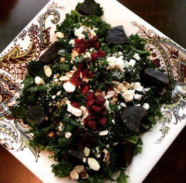 Massaged kale salad with purple potatoes, feta, sliced almonds and dried cranberries