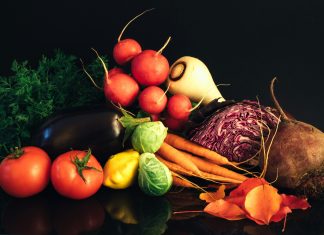 Central Florida Farmer’s Markets Sharon Pittaway via Unsplash various vegetables on a black background