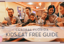 parents and children eating at a dinner table