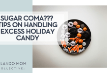 Tolgahan Akbulut via Unsplash bowl of Halloween candy on a white background with 'Sugar Coma??? Tips on Handling Excess Holiday Candy'