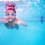 Boy-swimming-underwater