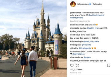 couple walking toward cinderella castle