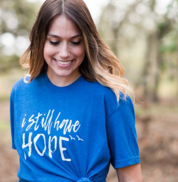 woman wearing infant loss tshirt that says I still have hope