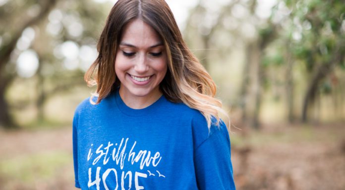 woman wearing infant loss tshirt that says I still have hope