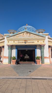 Golden Seahorse building exterior in tans and blue