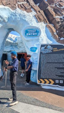 Penguin Exhibit entry sing that looks like ice on rocks