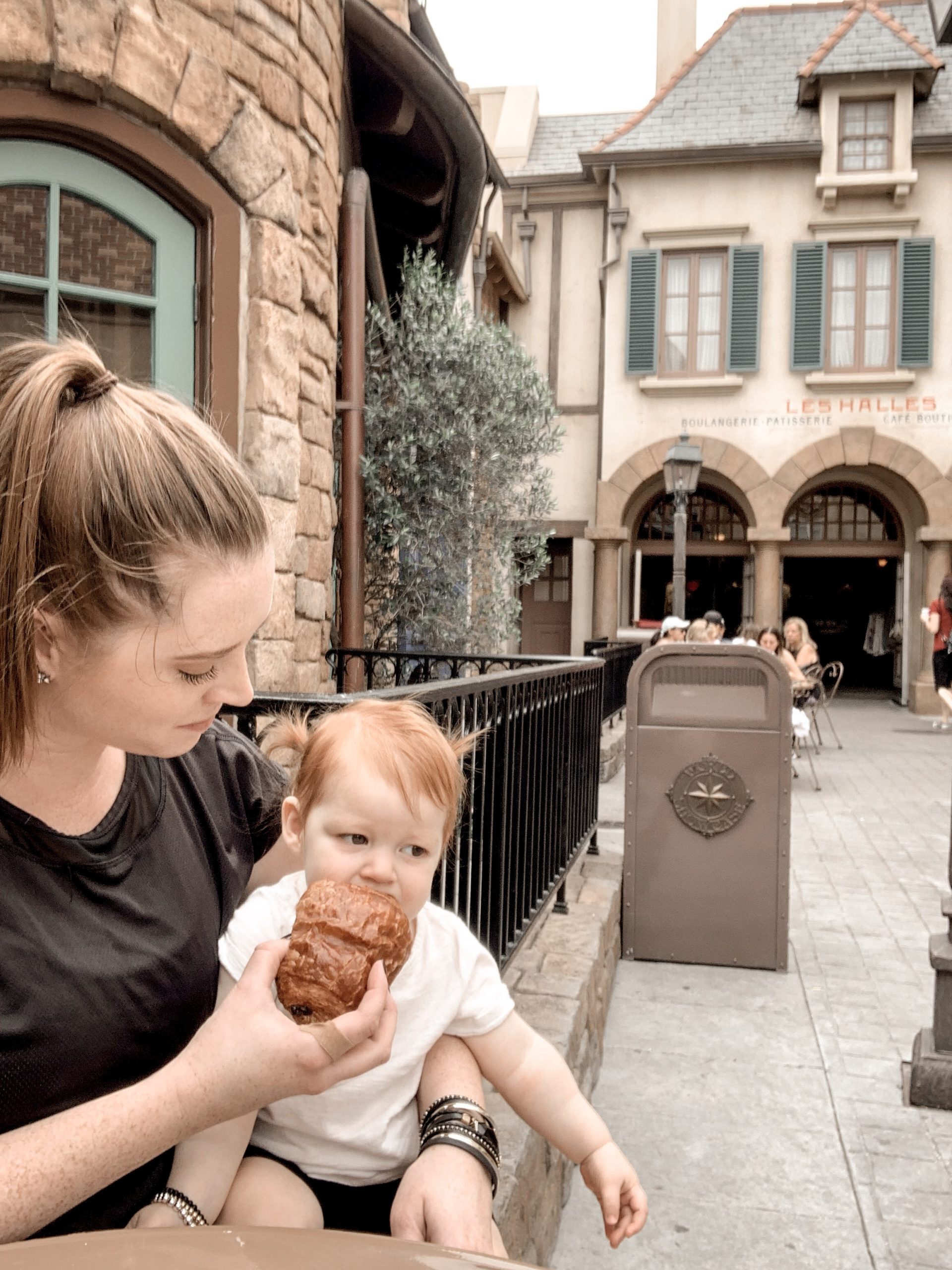 little girl and mom eating a treat