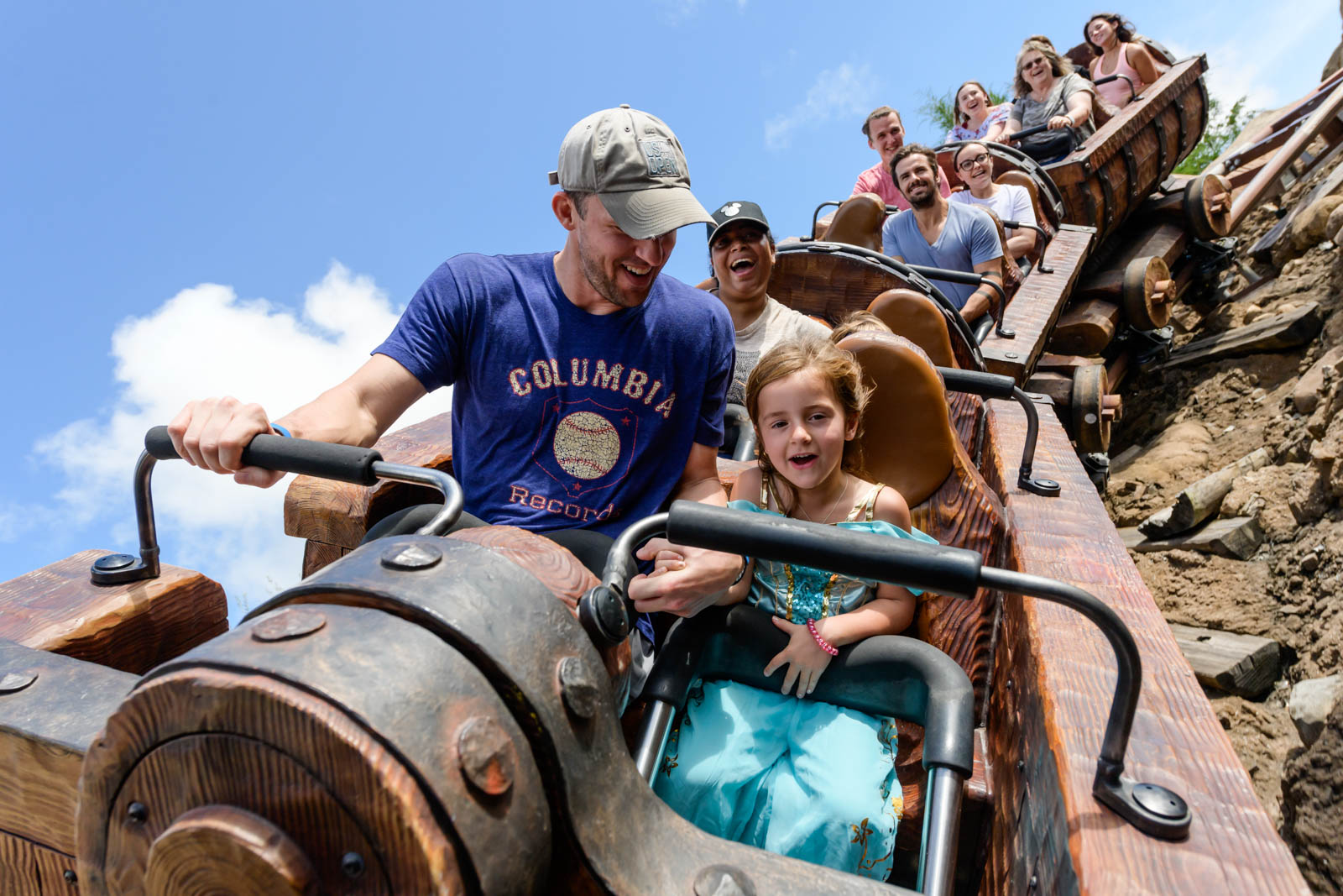 people on a rollercoaster from in front of the car