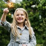 Small Girl Playing Outdoors Concept