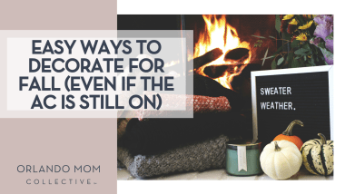 Rikkia Hughes via Unsplash fire in a fireplace with folded sweaters, a candle, little pumpkins and a sign that says 'sweater weather' in front of the fire with 'Easy Ways to Decorate for Fall (Even If The AC Is Still On)' on the left