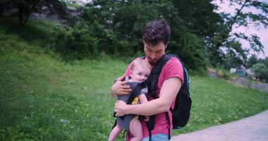 dad wearing a Copilot with a baby in it