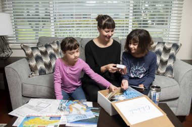 family opening celebrate states box