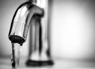 ttps://www.pexels.com/photo/macro-photography-of-a-stainless-steel-faucet-615326/ Alt text: A tap with water flowing from it