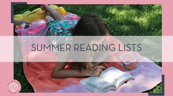 skylar-zilka via unsplash photo of girl reading on her belly and a towel in the grass with words 'summer reading lists' overtop