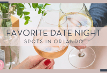 micheile henderson via unsplash image of two wine glasses cheersing with plant next to it with text ' favorite date night spots in orlando' over top of picture