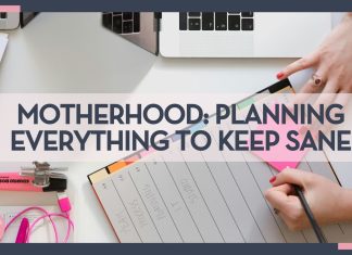 woman writing in a planner with a pen on a planner and post it note with an open computer beside her hand with words 'Motherhood: Planning Everything to Keep Sane' overtop