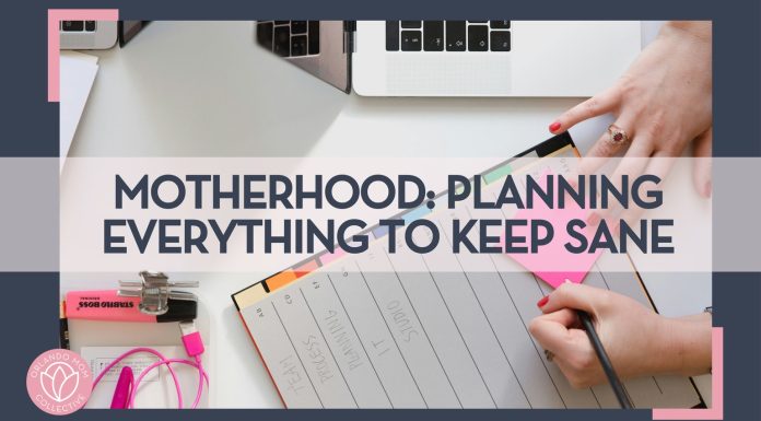 woman writing in a planner with a pen on a planner and post it note with an open computer beside her hand with words 'Motherhood: Planning Everything to Keep Sane' overtop