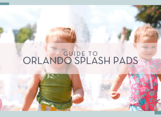 christian-bowen via unsplash photo of toddler girl in a green swim suit and toddler girl in pink and blue swim suit with water spraying behind them with words 'guide to orlando splash pads' over top