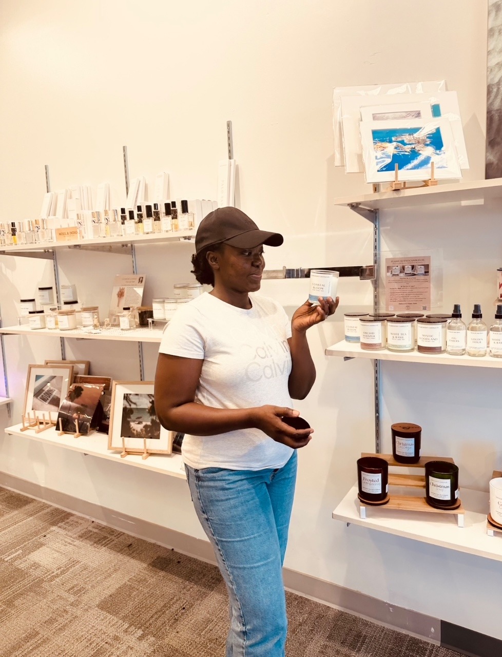 woman smelling a candle