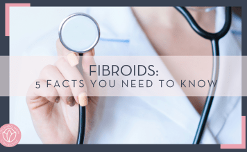 Alexandr Podvalny via unsplash phot of woman in lab coat holding up stethoscope with words 'Fibroids: 5 Facts You Need to Know'