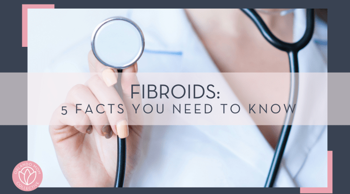 Alexandr Podvalny via unsplash phot of woman in lab coat holding up stethoscope with words 'Fibroids: 5 Facts You Need to Know'