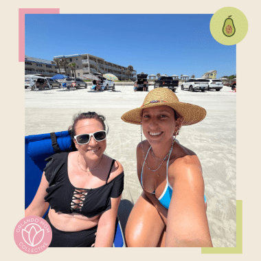 two women in bathing suits staring and smiling at the camera