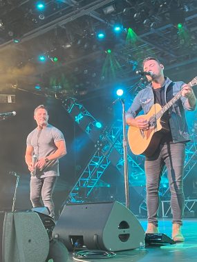 two men singing (BB mak) on stage for Eat to the Beat series at Epcot