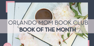 Orlando Mom Book Club: Book of the Month for November 2024 black coffee in white mug on open book with flowers and leaves on stems on the book and white table below book