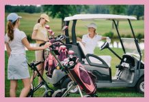 three women talking t each other while a golf retreat with golf clubs and golf cart