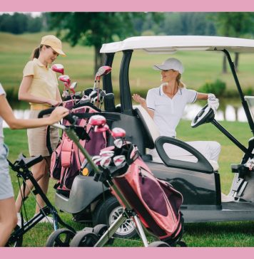 three women talking t each other while a golf retreat with golf clubs and golf cart