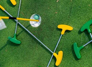 mini golf clubs on the green for disney activities in orlando