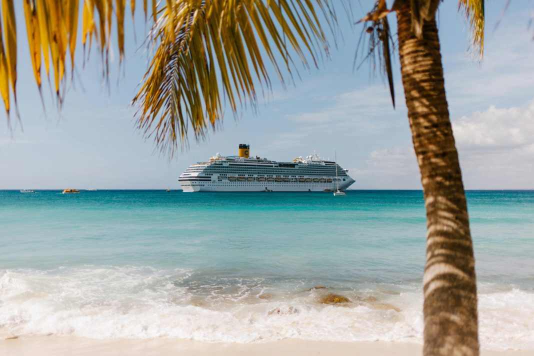 photo of cruis ship in the distance taken from the beach; cruising with teens