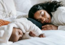 first-time moms sleeping with baby next to her