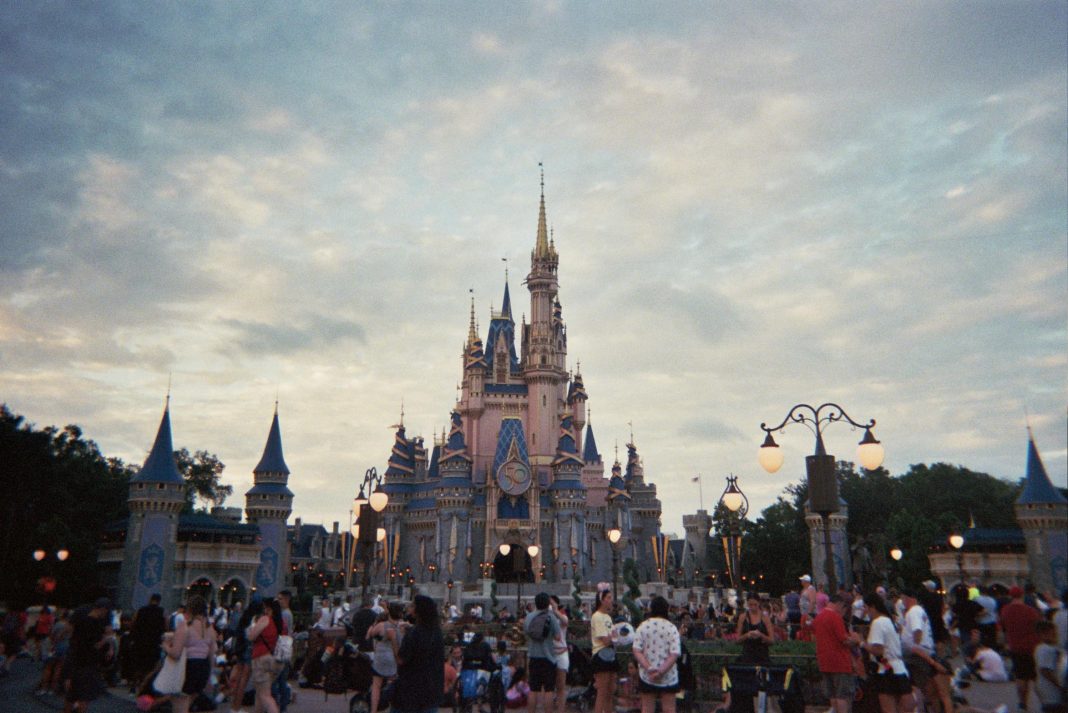 pexels-madison-santangelo-223565943-11991584 view of cinderella castle in disney world, raising kids on a budget in orlan do