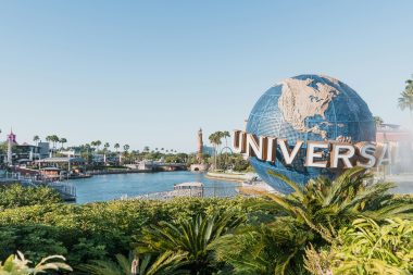 Aditya Vyas via unsplash universal logo globe with islands of adventure behind
