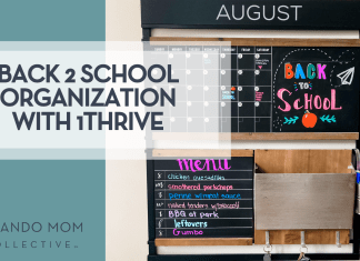 Back-to-School Organization with 1Thrive Back-to-School Organization with 1Thrive wall command center showing an August calendar, colorful “Back to School” chalk art, weekly menu board, mail pocket, and cup of markers—all mounted on a sleek black frame for streamlined family scheduling.