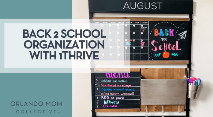 Back-to-School Organization with 1Thrive Back-to-School Organization with 1Thrive wall command center showing an August calendar, colorful “Back to School” chalk art, weekly menu board, mail pocket, and cup of markers—all mounted on a sleek black frame for streamlined family scheduling.