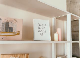 Back-to-School Chaos? Here’s How to Calm the Visual Noise at Home Letter board on a crowded wooden shelf surrounded by scattered supplies, perfectly capturing back-to-school chaos