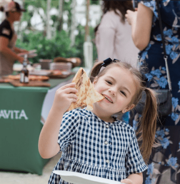 Three images showing accessible, family-friendly food: dry pasta from Colavita and tomato sauce ready for cooking, a young girl smiling while eating a handheld snack, and a lunchbox filled with pastry pockets and chips.
