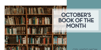 Trnava University via Unsplash library shelves full of books with "October's book of the month" on the right.