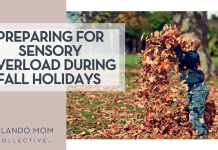 Preparing for Sensory Overload During Fall Holidays Scott Webb via Unsplash boy child with navy long shirt and jeans on throwing fall leaves in the air with 'preparing for sensory overload during fall holidays' on the left